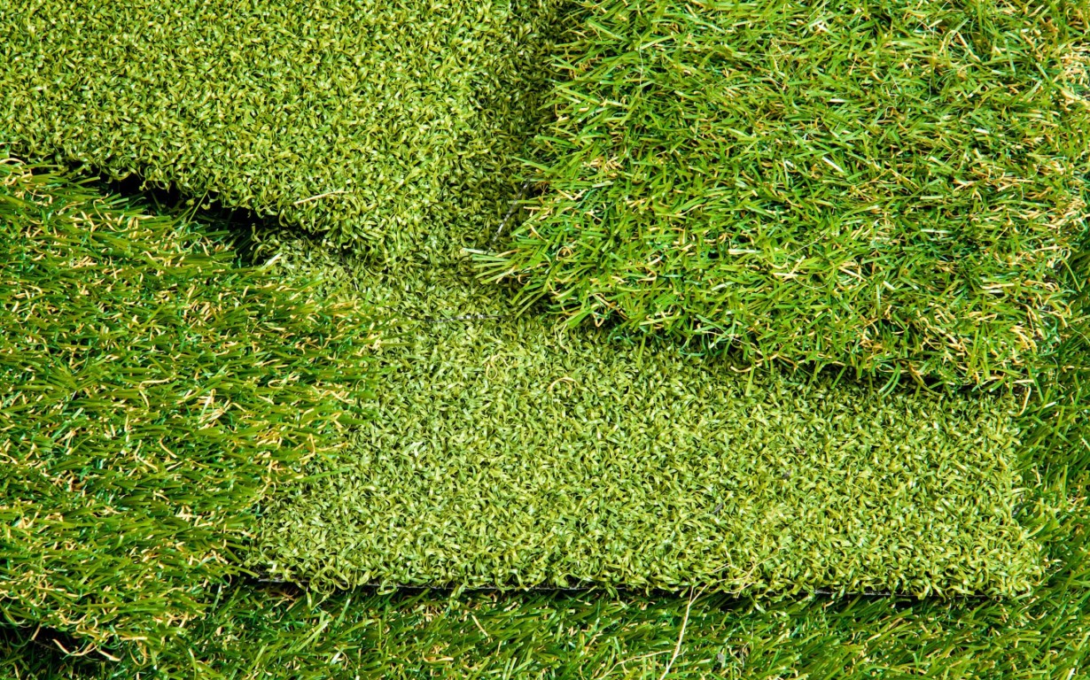 High-quality artificial grass samples showing realistic texture